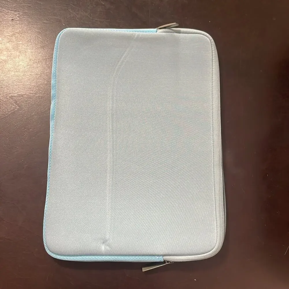 MacBook New Pro 13” shell and light blue soft case